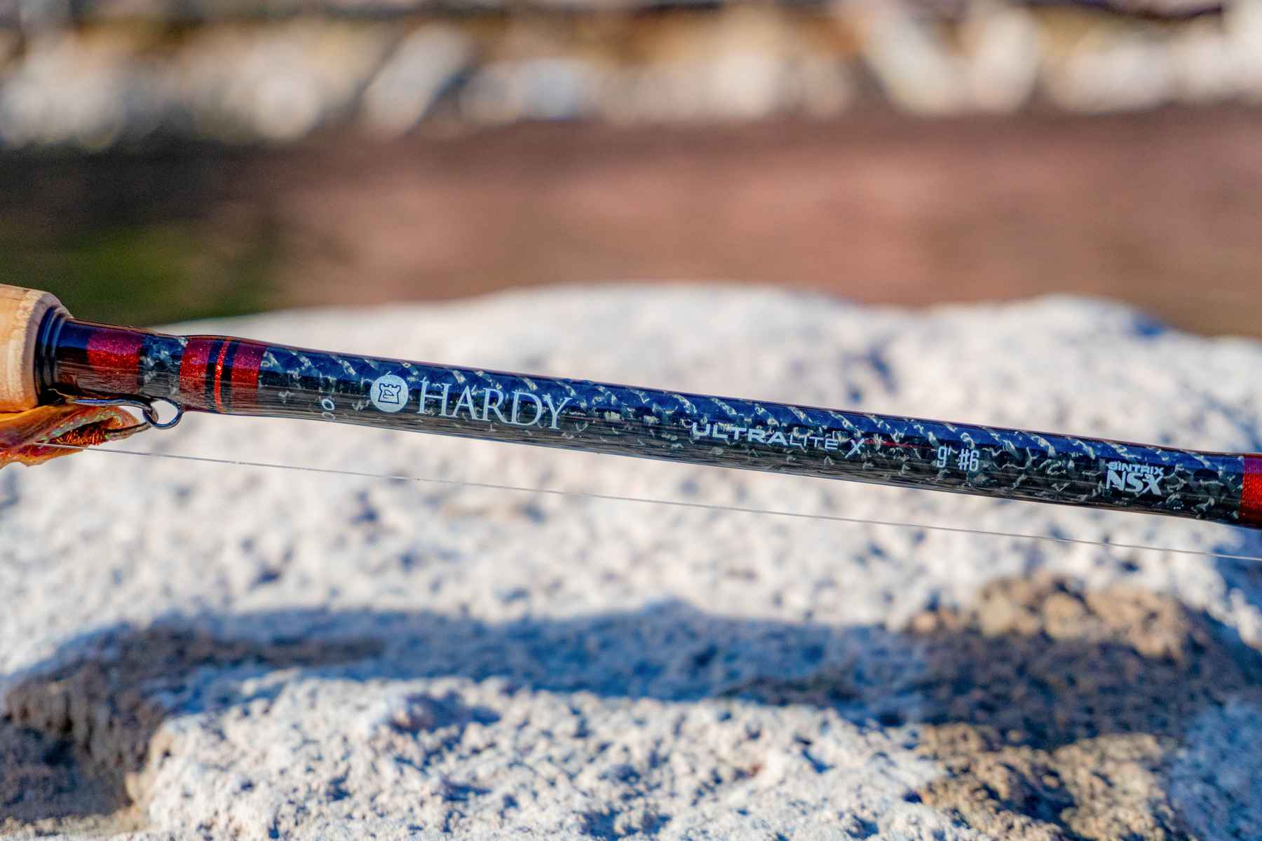 Two vintage fishing rods by HARDY'S, one for trout the other for salmon,  both in original