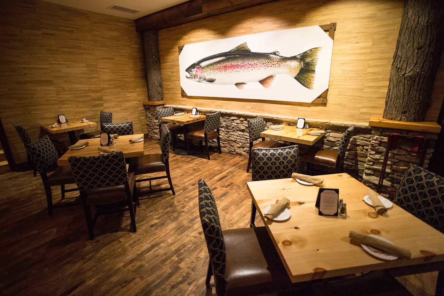 One of the corners of the lodge restaurant's dining room, which sits atop the school's original gymnasium floor (photo: Chad Shmukler). Tailwater Lodge - Restaurant