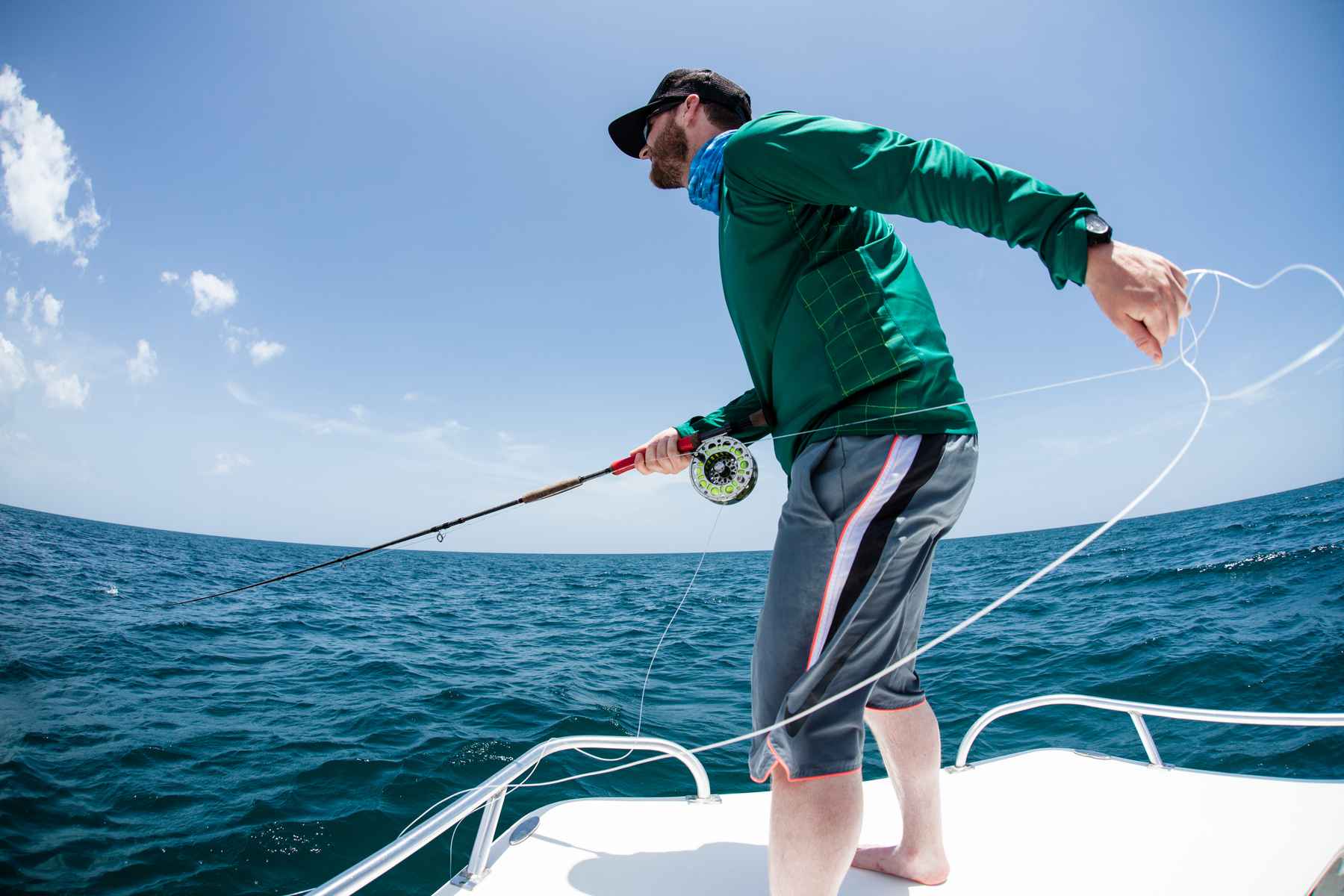 Angler Jay Beebe strips feverishly to entice the strike of a false albacore (photo: Chad Shmukler). blue water fly fishing