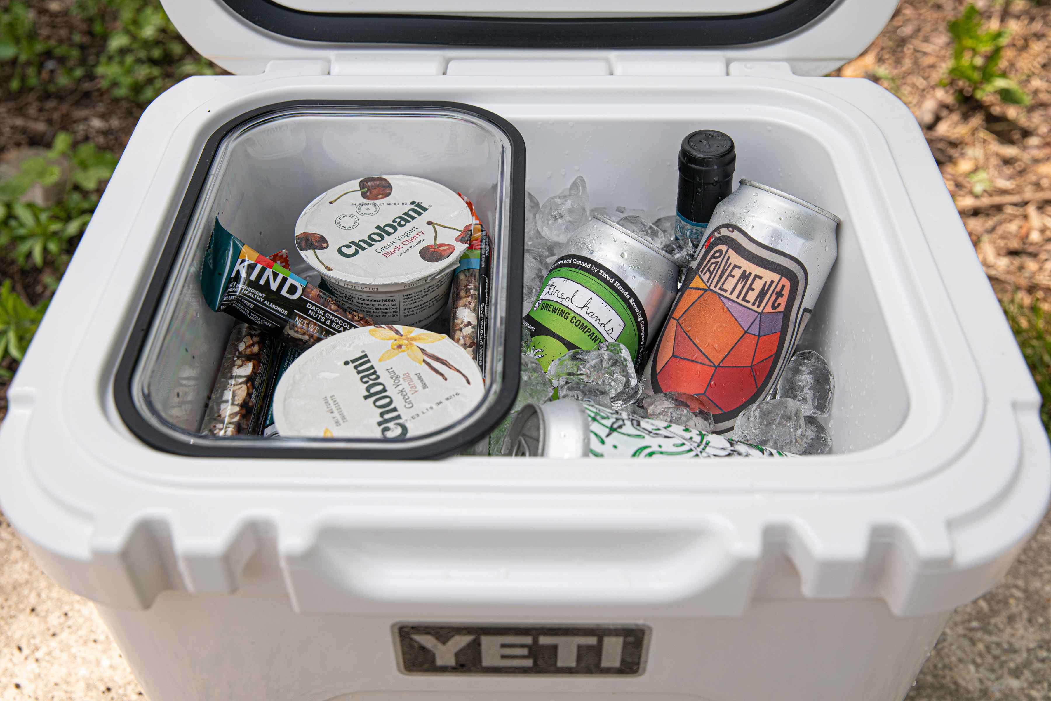 Wine bottles stand upright in the new YETI Roadie and snacks/etc stay dry in the YETI Dry Goods Basket (photo: Chad Shmukler). 2020 yeti roadie cooler capacity