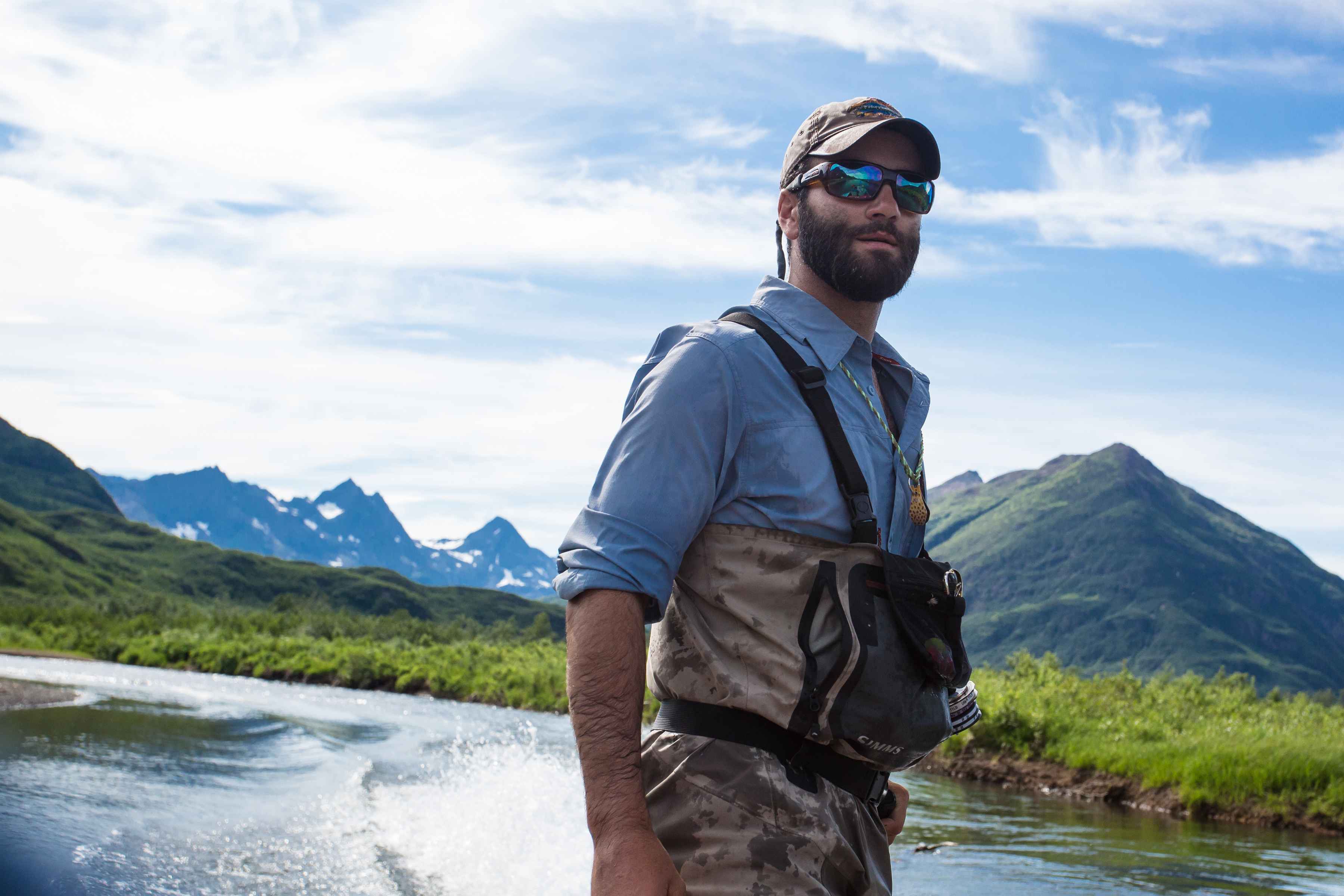 Guide Jordan Gill navigates the Wind River, en route as it approaches Kulik Lake (photo: Chad Shmukler). Wood Tikchik National Park - Alaska