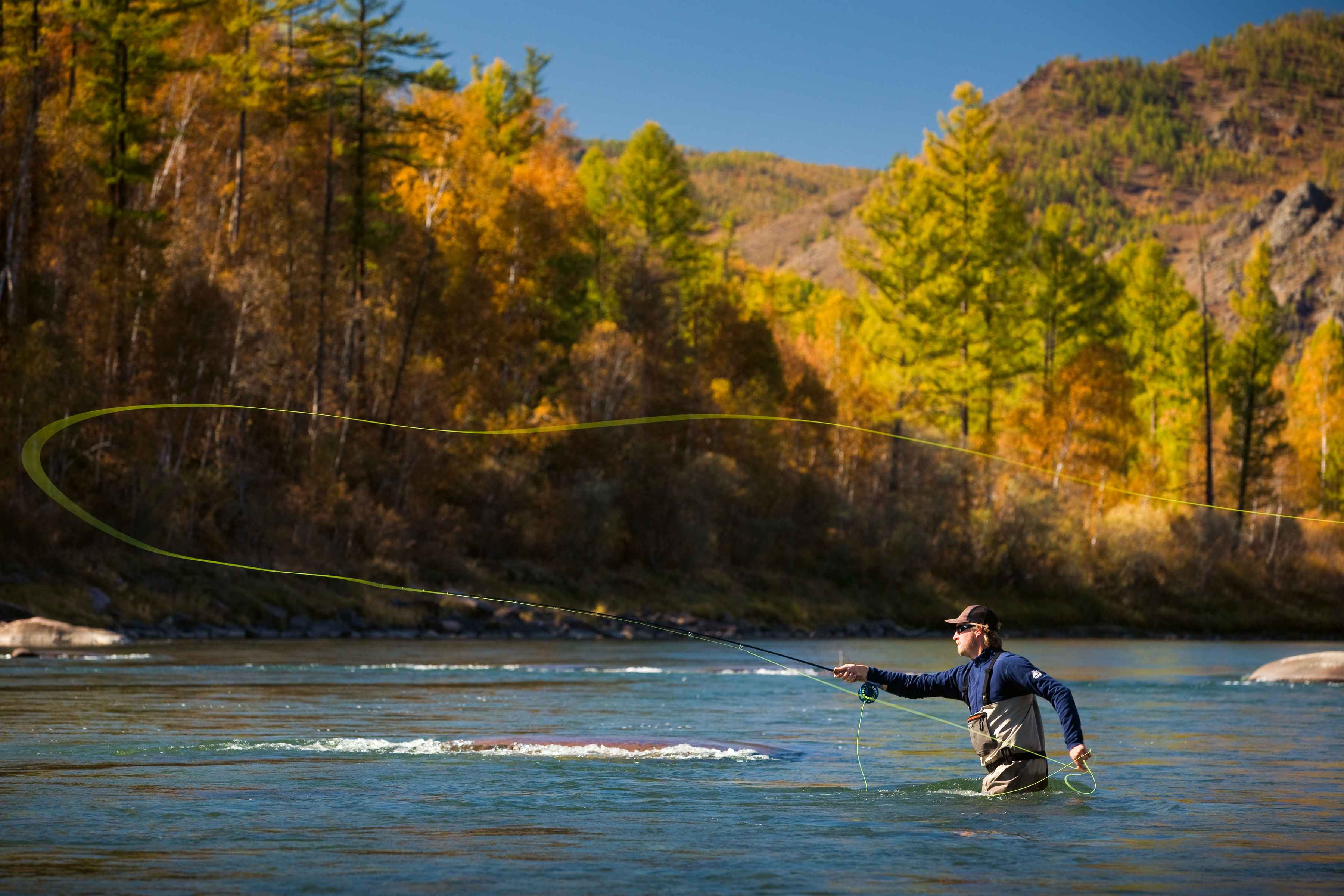 Angler Rich Hohne casting on the Eg River in Mongolia (photo: Matt Harris / "The Fish of a Lifetime"). Angler Rich Hohne casting on the Eg River in Mongolia
