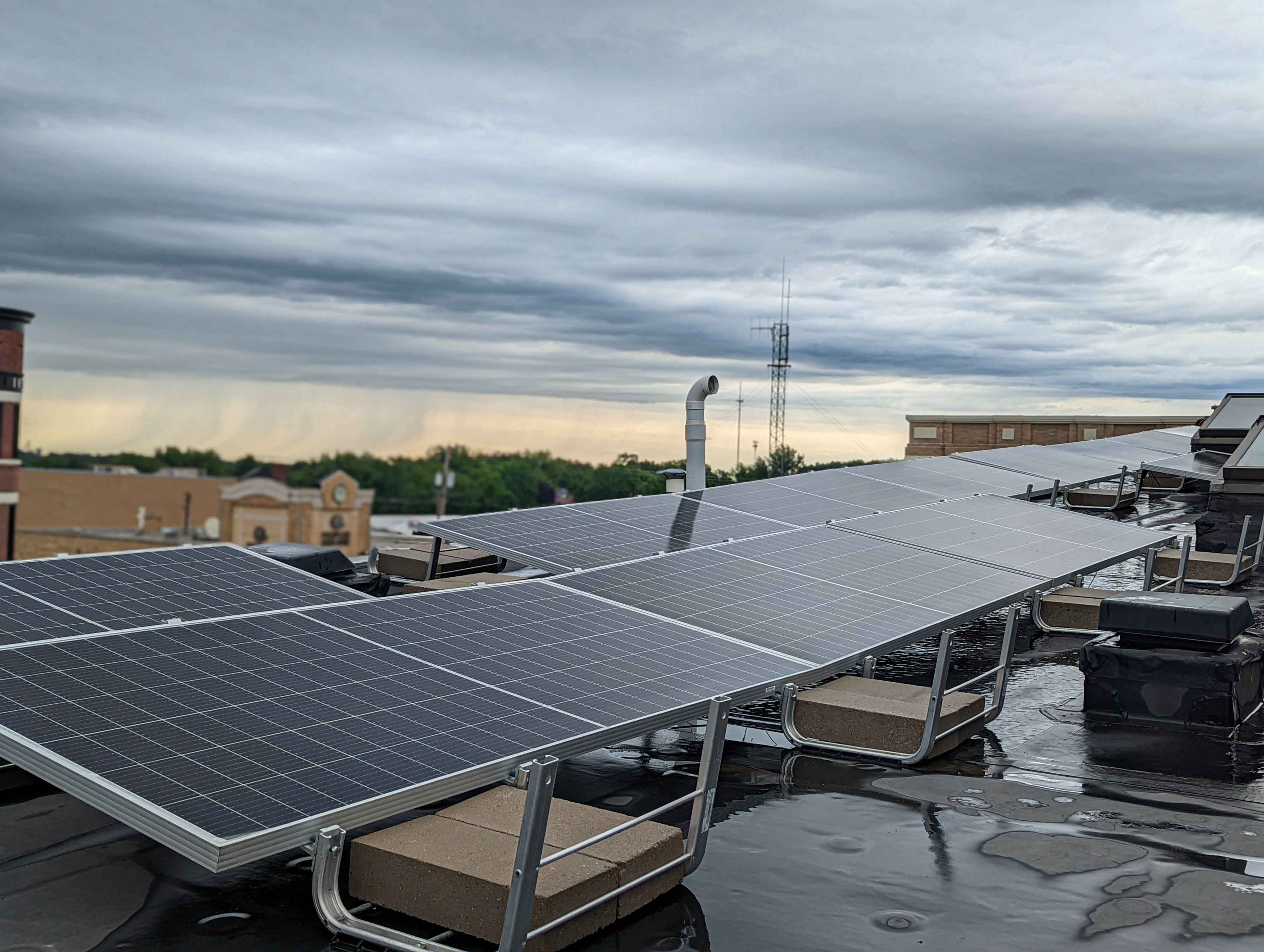 Solar panels installed on the top of the Driftless Angler fly shop (photo: Geri Meyer). solar panels driftless angler