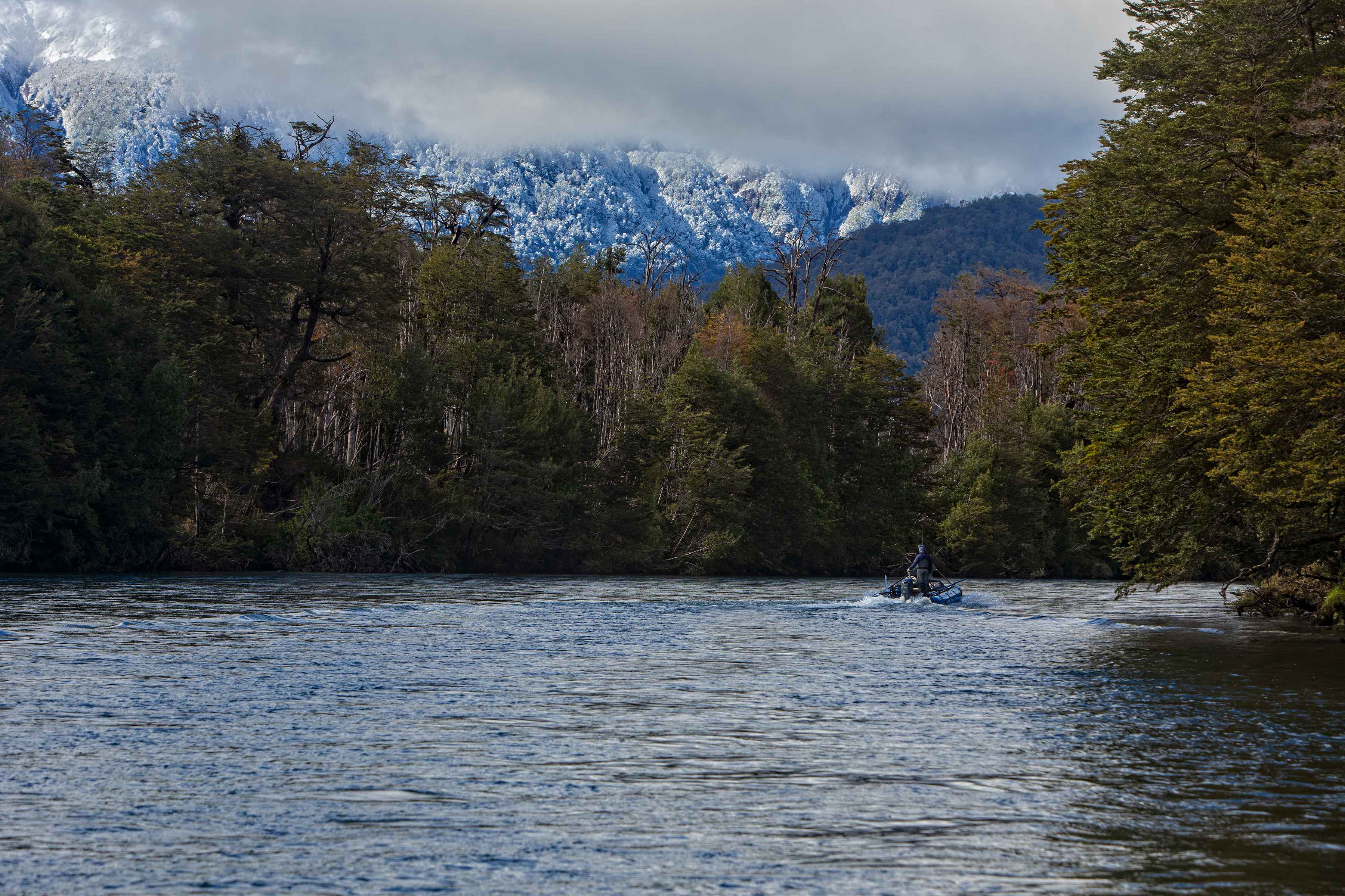 Snow-tinged mountains greet anglers headed upriver to start the day on Chile's River of Dreams (photo: Earl Harper). river of dreams - rio blanco - chile - fly fishing
