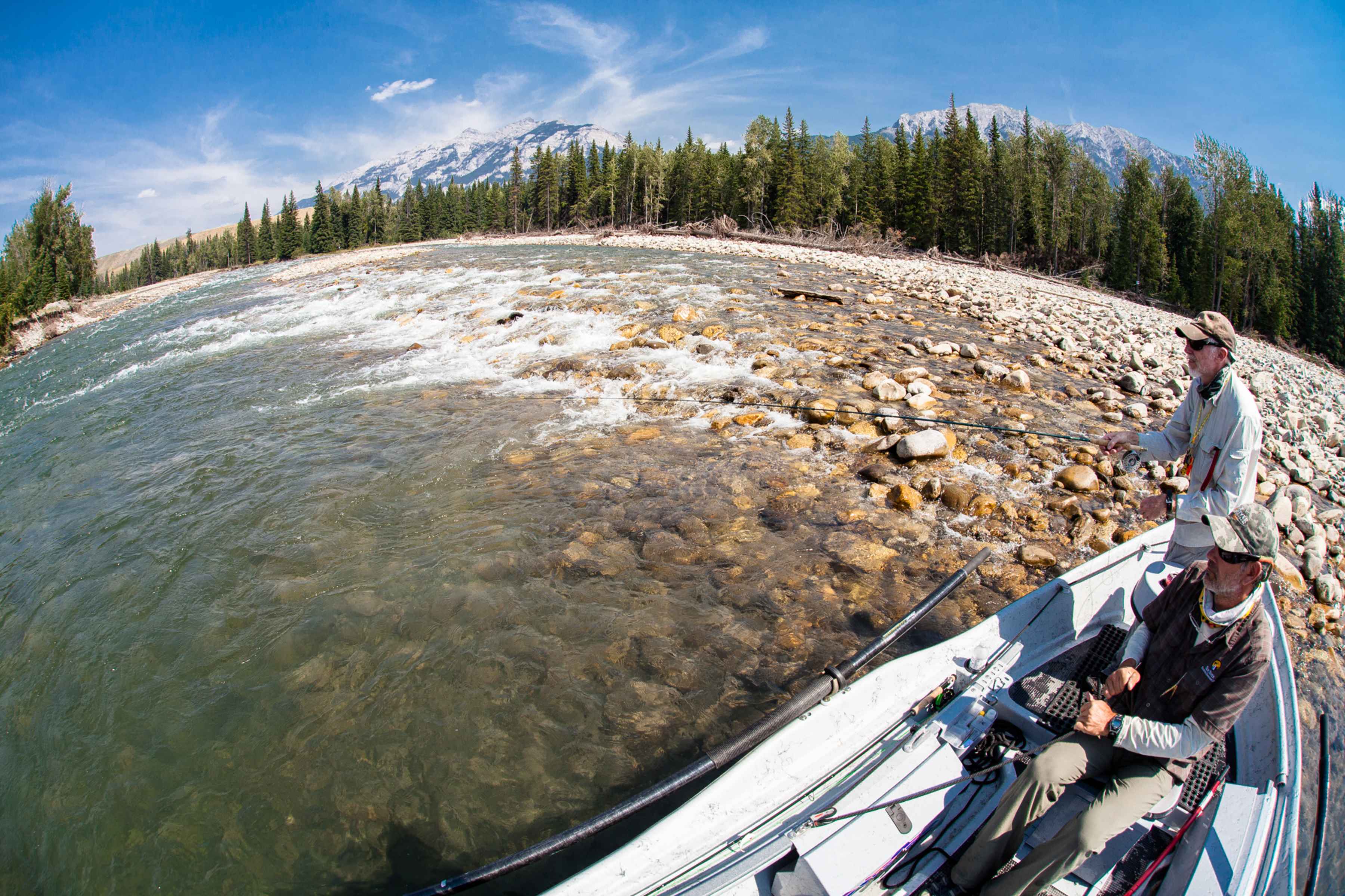 Paul Samycia holds the drift boat in position while Mike Sepelak works a picture-perfect piece of Elk water. Elk River British Columbia