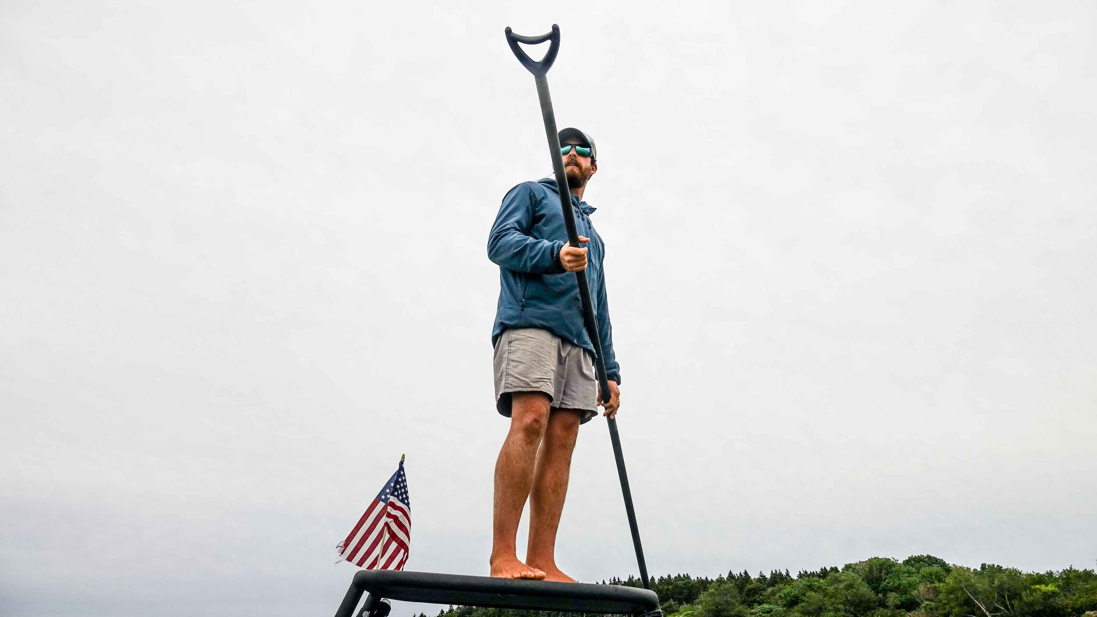Guide and lodge owner Kyle Schaefer on the poling platform (photo: Paul Moinester). kyle schaefer bahamas