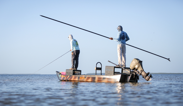 In some areas of the glades, poling is the only permissible means of getting your boat from one spot to the next (photo: Dan Decibel). Everglades Flats Skiff